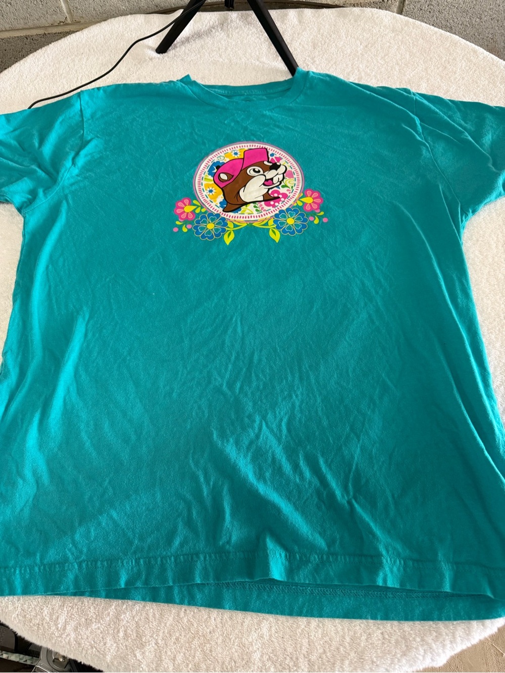 Buckees Teal Graphic Tee size large floral/spring theme
